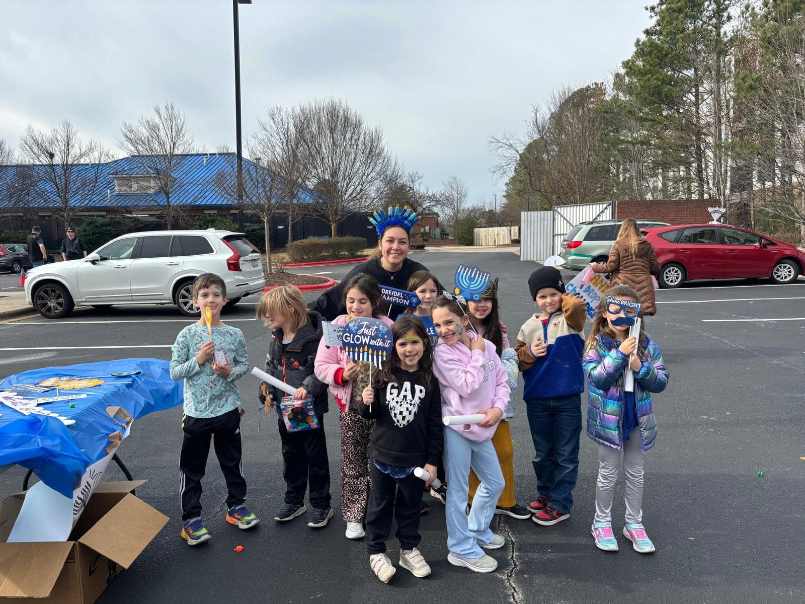 Outdoor Chanukah glow event with menorah headbands